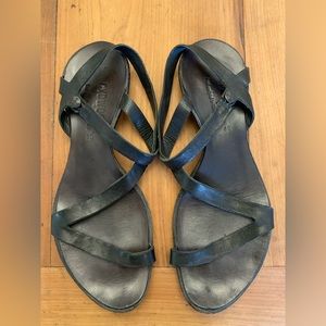 Black CYDWOQ minimalist leather sandals.